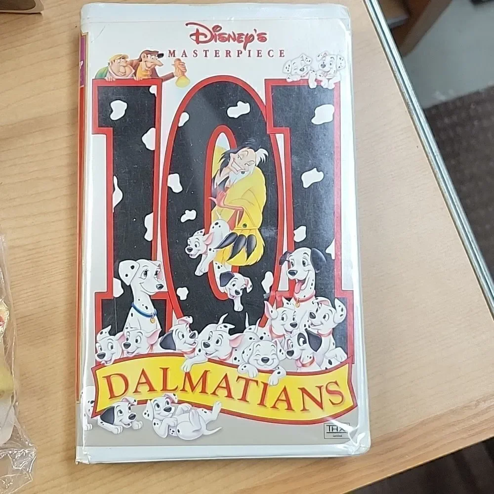 101‎ Dalmations bundle 2vhs movies, dog figure, Cruella De Vil figure